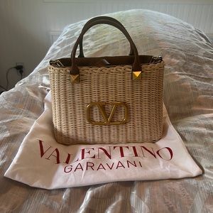 Valentino small straw and leather bucket bag.